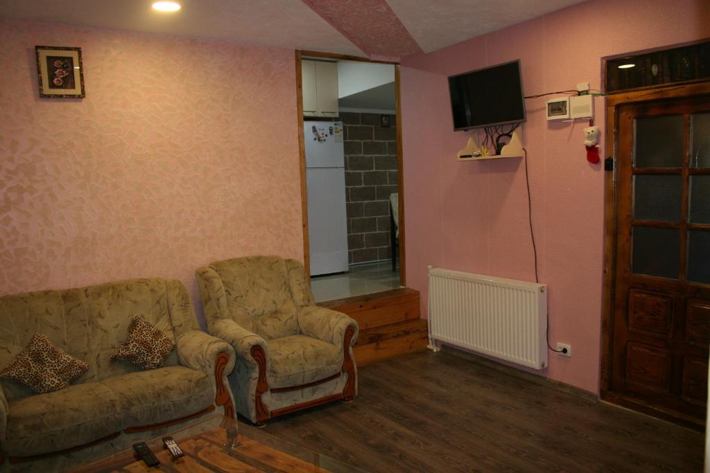 Posezení v ubytování Guest House Nima