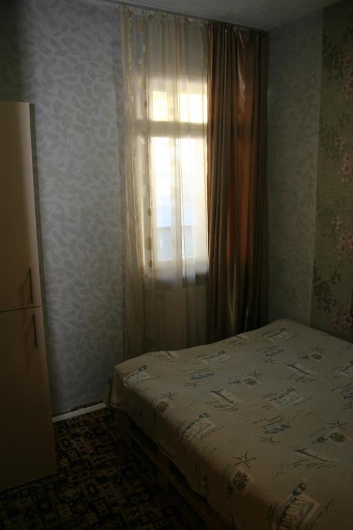 Postel nebo postele na pokoji v ubytování Guest House Nima