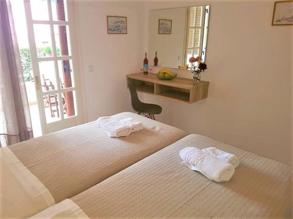 Postel nebo postele na pokoji v ubytování Stavroula Apartment