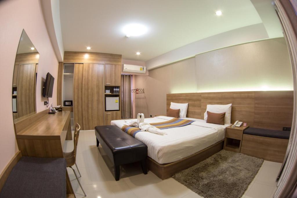 Katil atau katil-katil dalam bilik di Unity Hotel