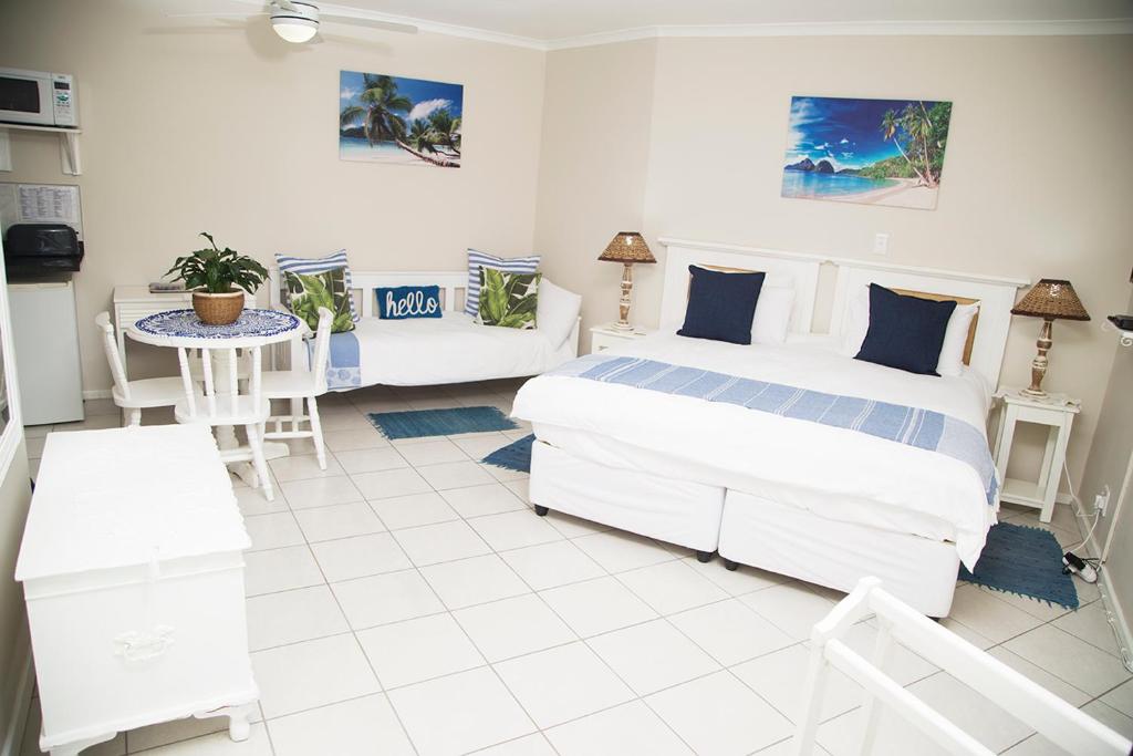 Ansteys Beach Self Catering Apartments - Cabaña Con Patio