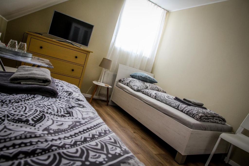 Posteľ alebo postele v izbe v ubytovaní Ubytovanie Pri Ceste