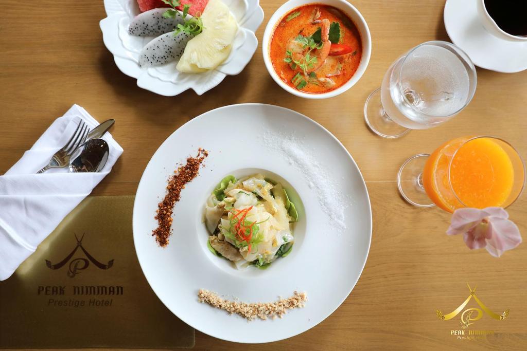 Peak Nimman Prestige Hotel - Resim 8