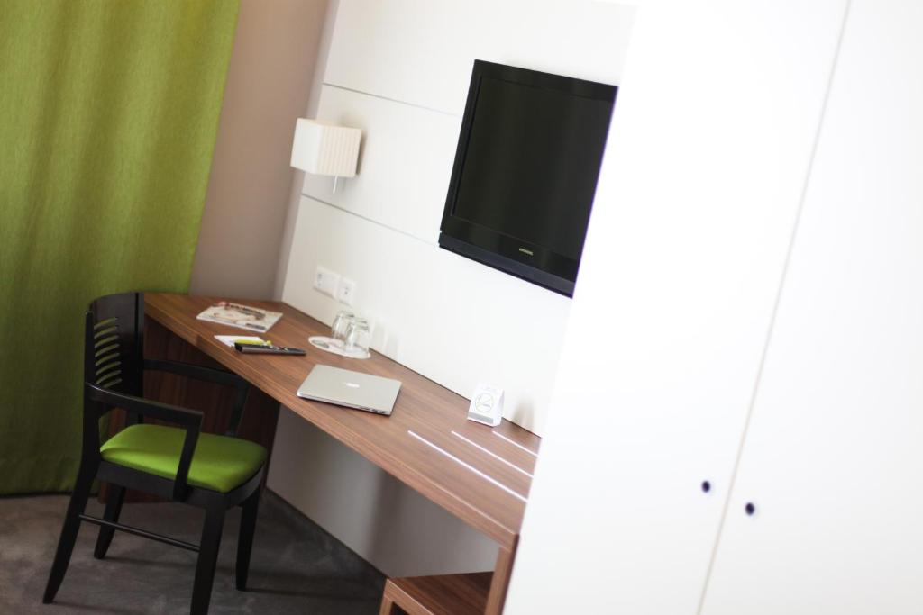 TV a/nebo společenská místnost v ubytování Hotel Kunstmühle