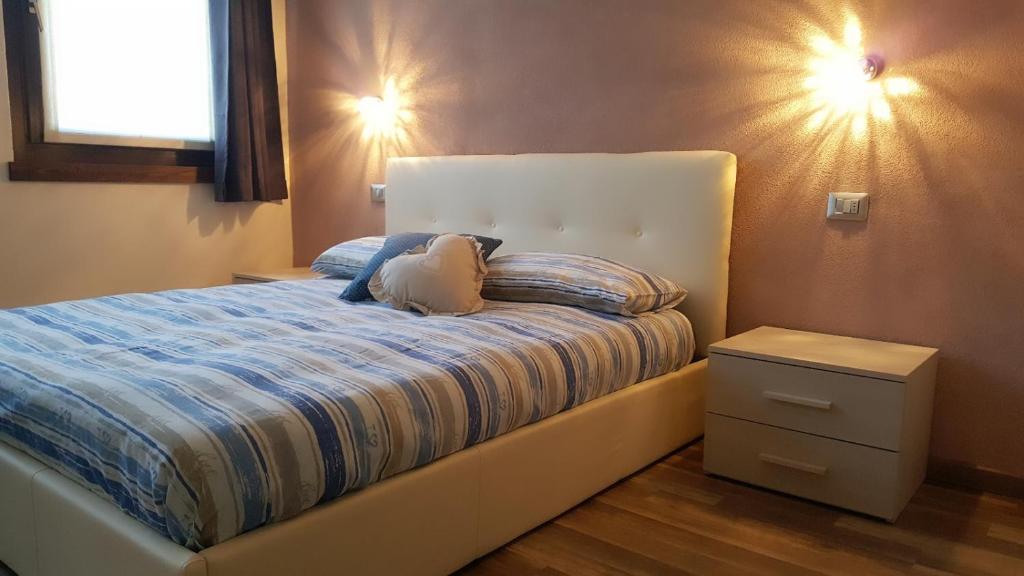 Posteľ alebo postele v izbe v ubytovaní Cuorematto