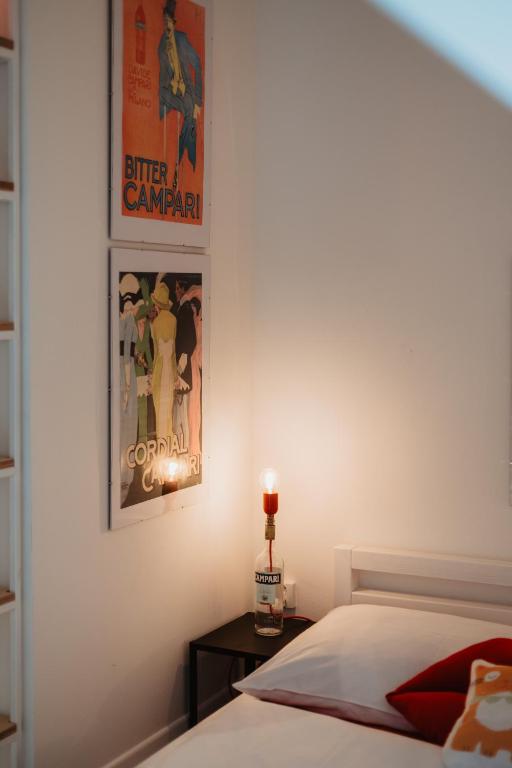 A bed or beds in a room at Street Food Possonium Apartments