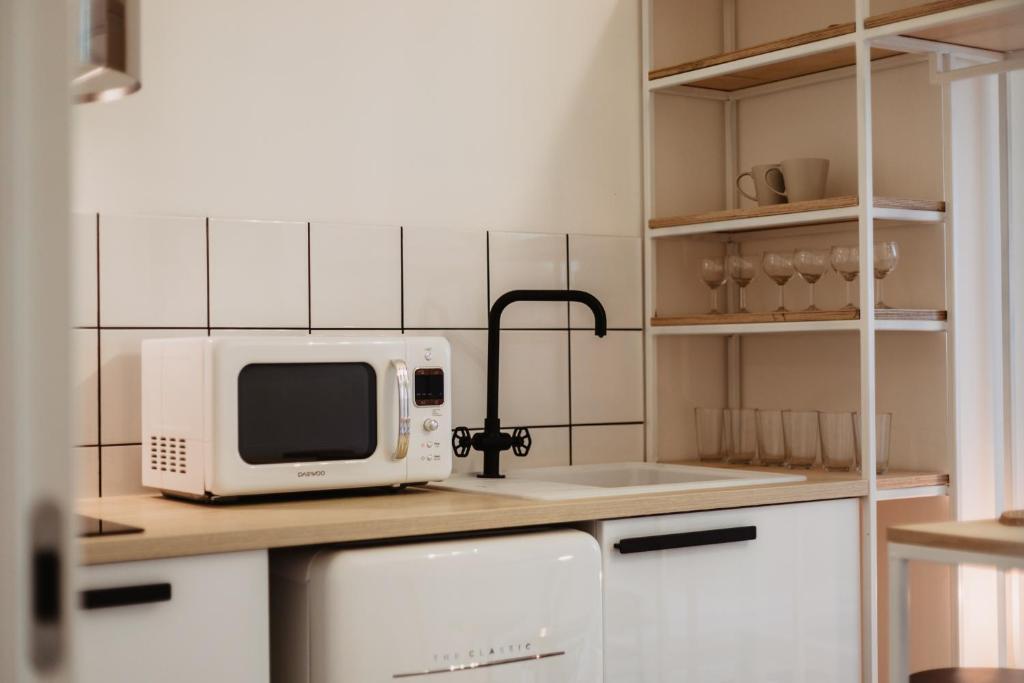 A kitchen or kitchenette at Street Food Possonium Apartments