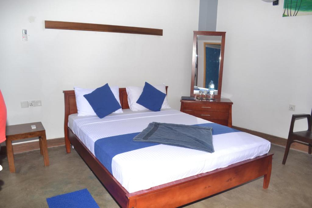 Postel nebo postele na pokoji v ubytování Hotel Thilon