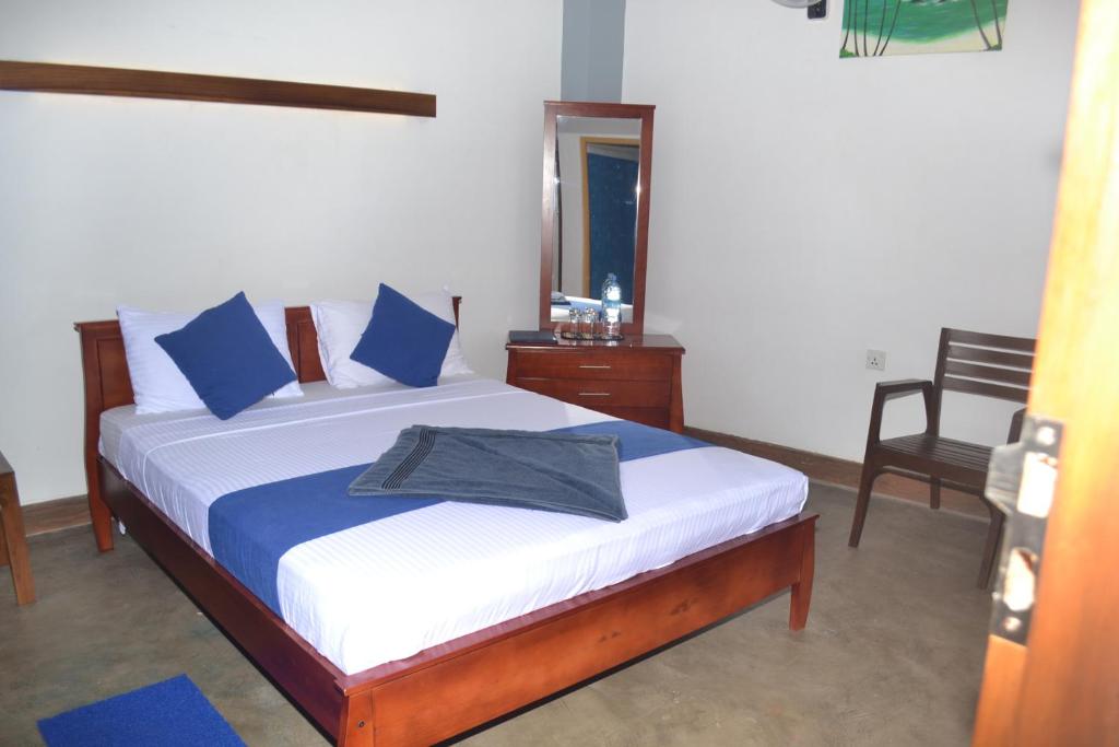 Postel nebo postele na pokoji v ubytování Hotel Thilon