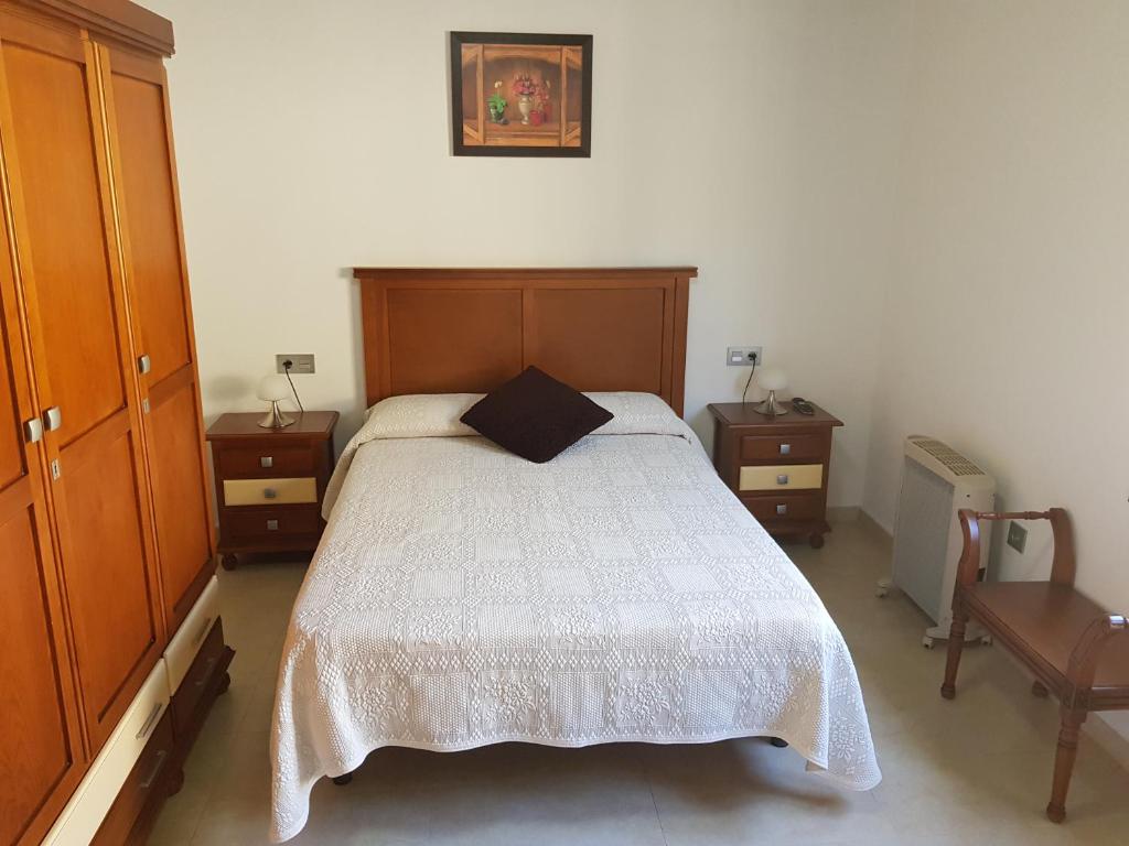 Postel nebo postele na pokoji v ubytování Casita la Herilla