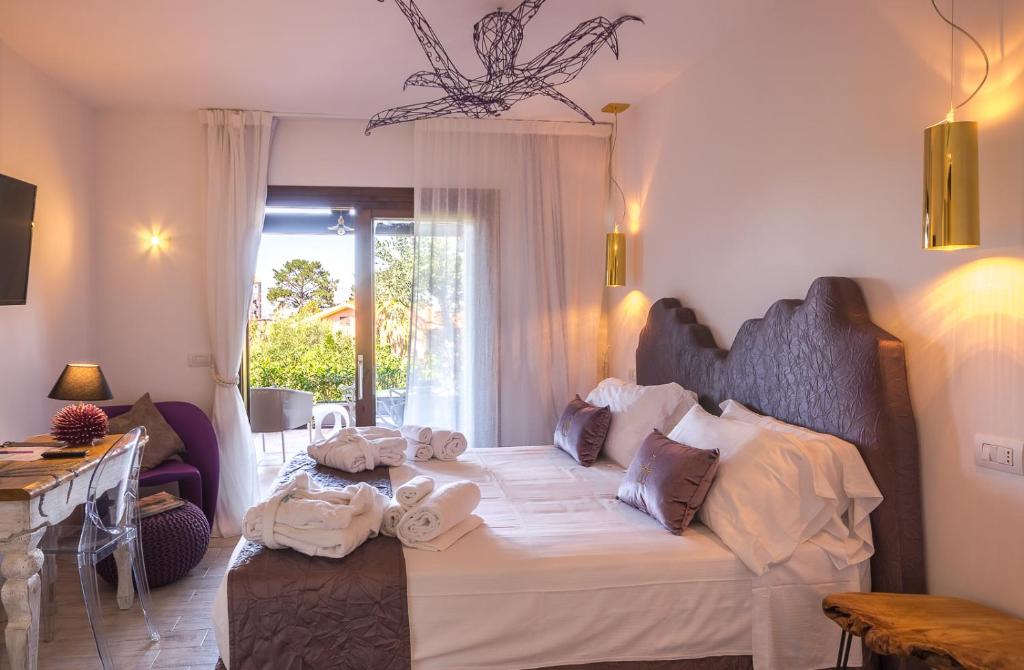 Foto dalla galleria di Geco di Giada Art Suites - Adult Only a Porto Rotondo