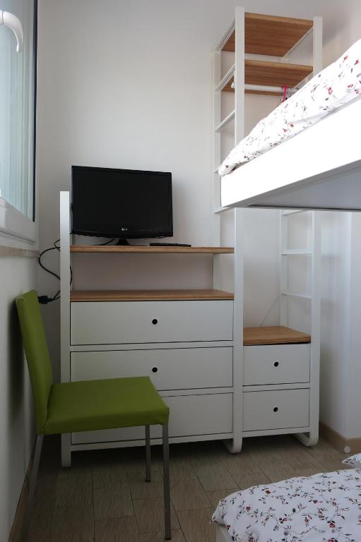 TV a/nebo společenská místnost v ubytování Hotel Marco
