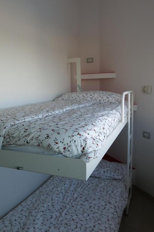 Postel nebo postele na pokoji v ubytování Hotel Marco