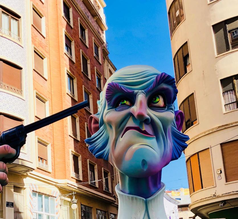 a statue in the middle of a street at Cozy apartment in Valencia center in Valencia