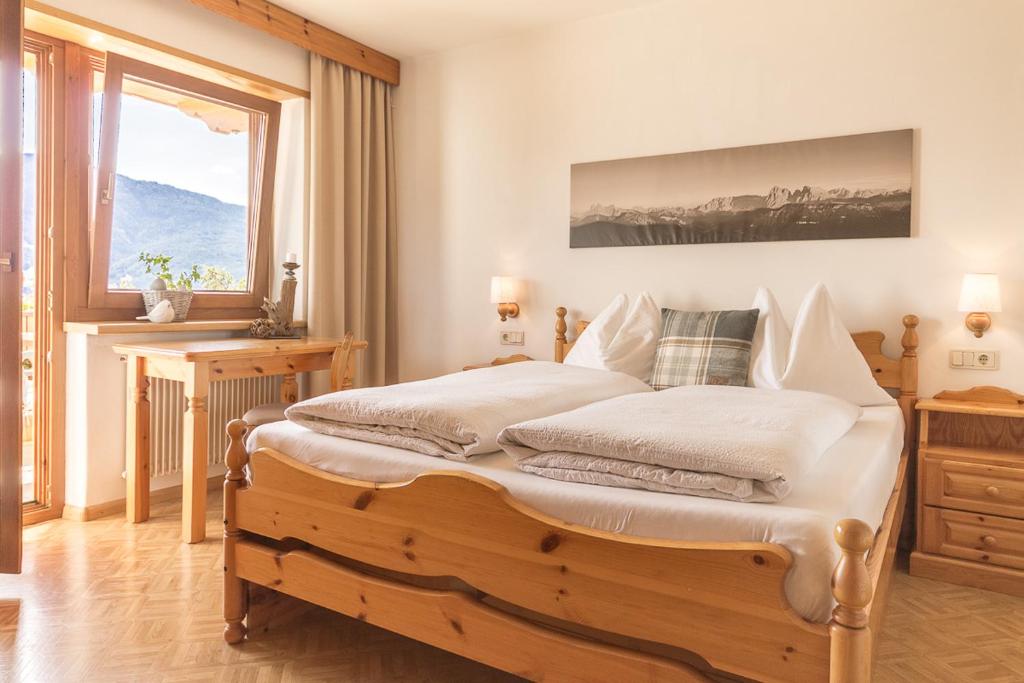 Postel nebo postele na pokoji v ubytování Appartements Kerschbaumer