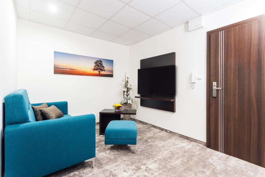 TV a/nebo společenská místnost v ubytování Hotel Crystal