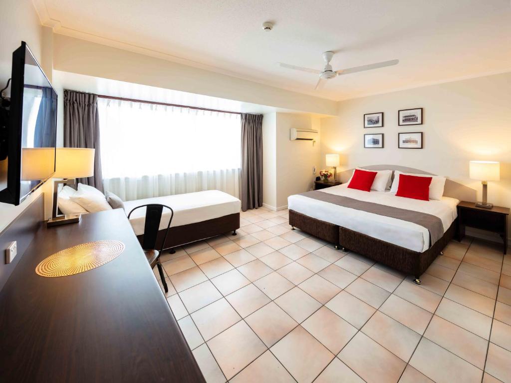 Postel nebo postele na pokoji v ubytování Hides Hotel
