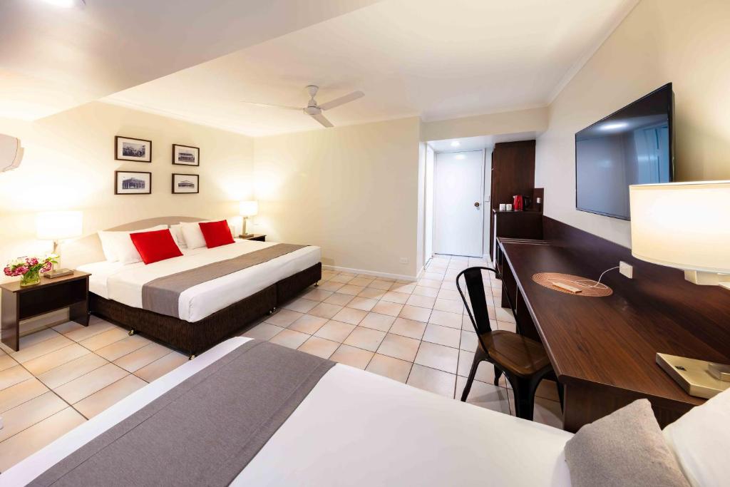 Postel nebo postele na pokoji v ubytování Hides Hotel