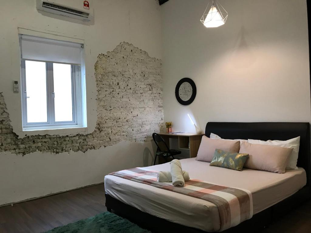 Voodi või voodid majutusasutuse Check In Lodge toas