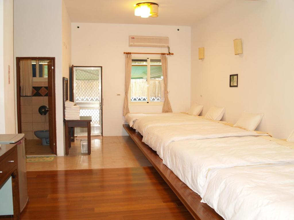 Postel nebo postele na pokoji v ubytování Dainty Spa Hotel