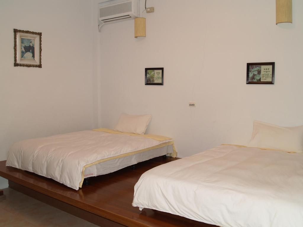 Postel nebo postele na pokoji v ubytování Dainty Spa Hotel