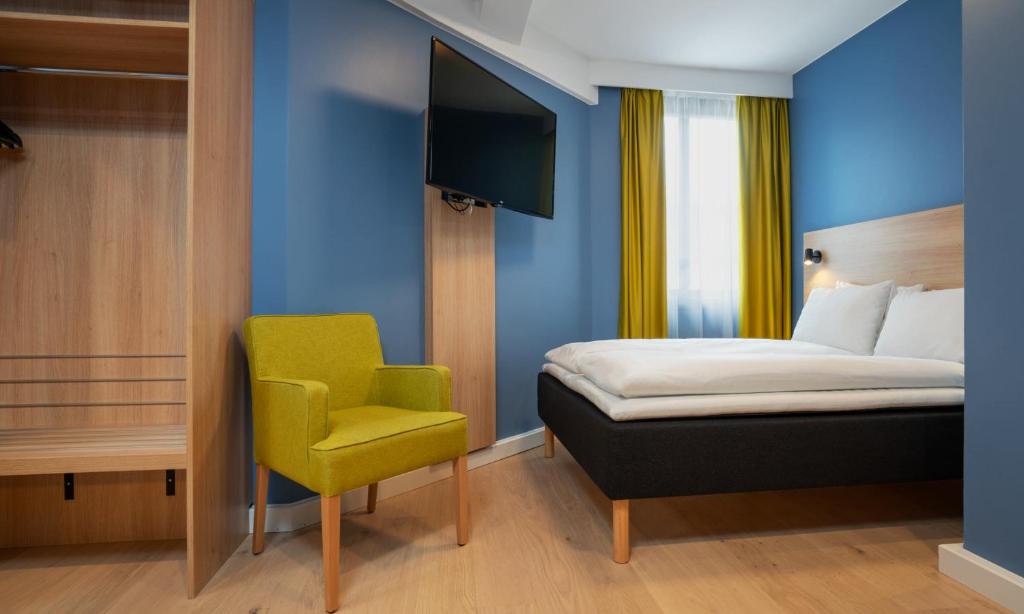 Postel nebo postele na pokoji v ubytování Thon Hotel Astoria