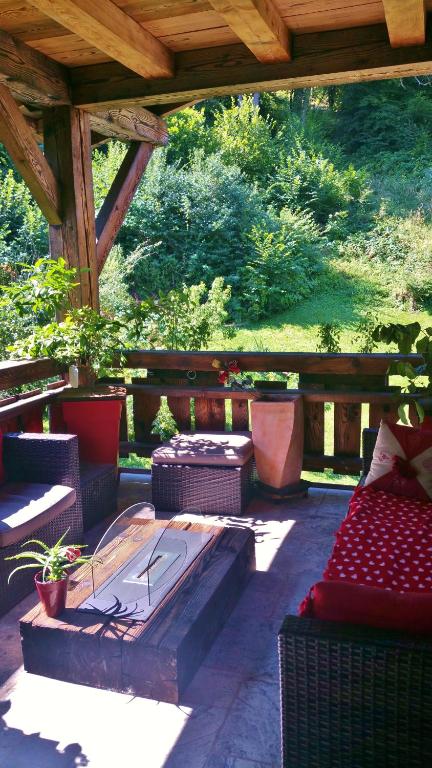 Posezení v ubytování Chambres d'Hôtes Chalet de la Source