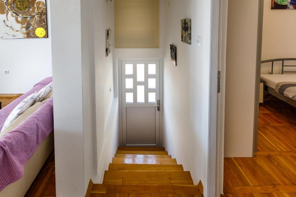 Postel nebo postele na pokoji v ubytování Apartment Iris & Elena