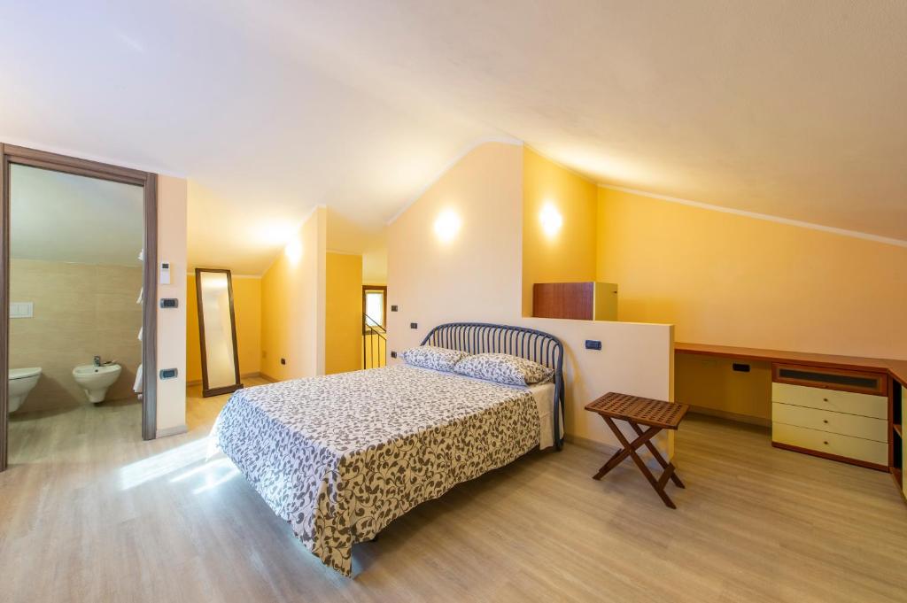 Posteľ alebo postele v izbe v ubytovaní Appartamenti Arco Antico