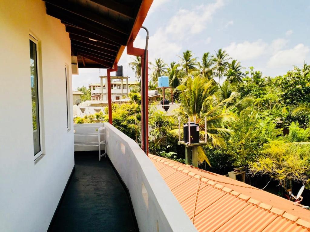 Zahrada ubytování Hikkaduwa Family Inn