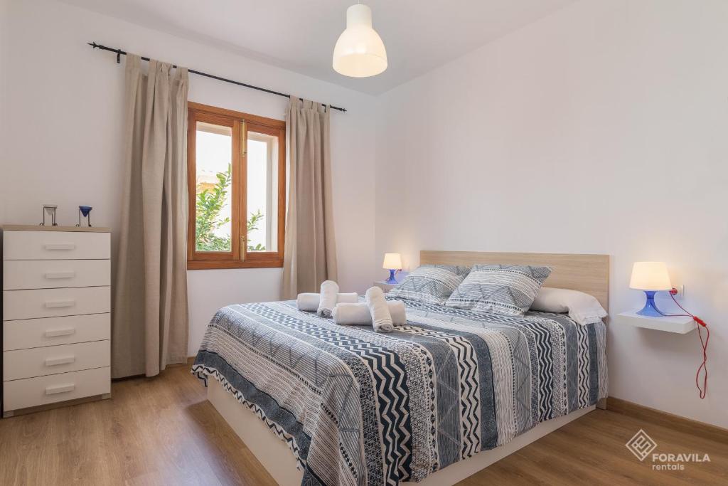 Postel nebo postele na pokoji v ubytování Casa Embat