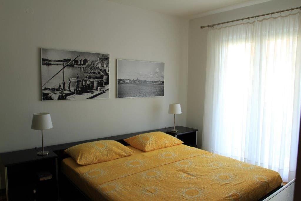 Postel nebo postele na pokoji v ubytování Vila Rojana