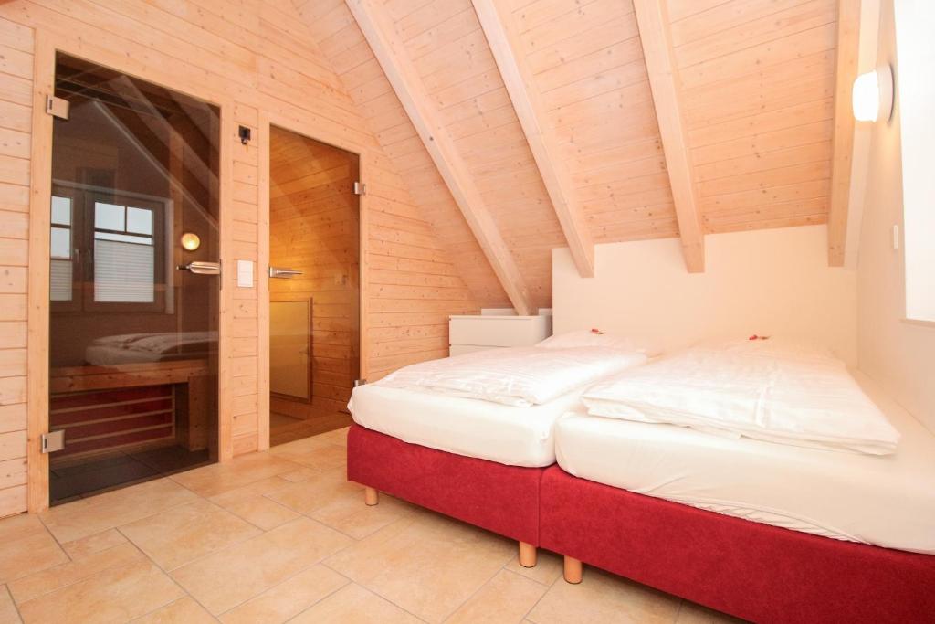 Postel nebo postele na pokoji v ubytování Logierhaus-Greetsiel 1