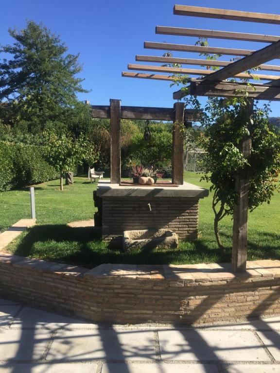 Vonkajšia záhrada v ubytovaní La Pergola B&B