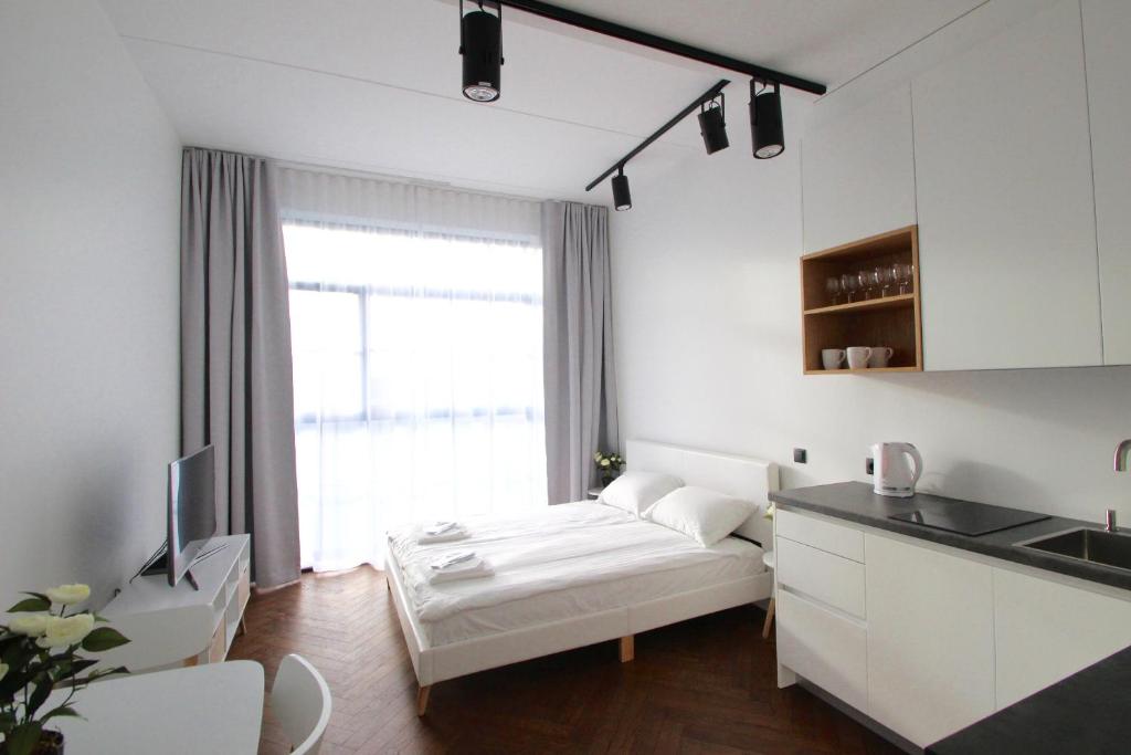 Ένα ή περισσότερα κρεβάτια σε δωμάτιο στο Baltic Accommodation 1 - Rumbi 4-36