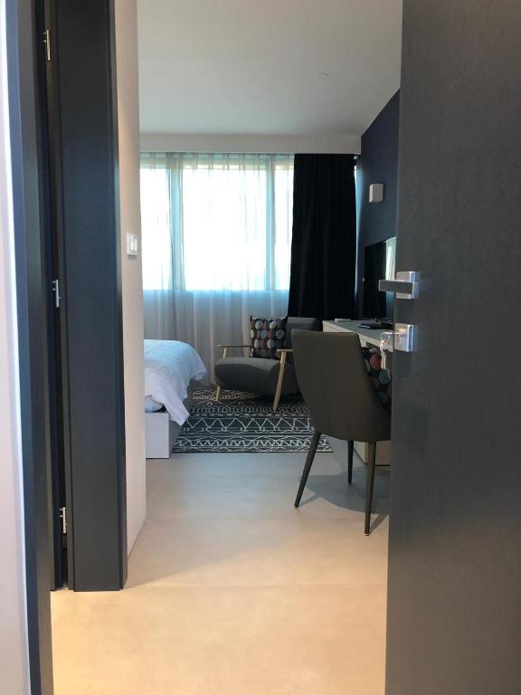 Postel nebo postele na pokoji v ubytování Hotel Cubis