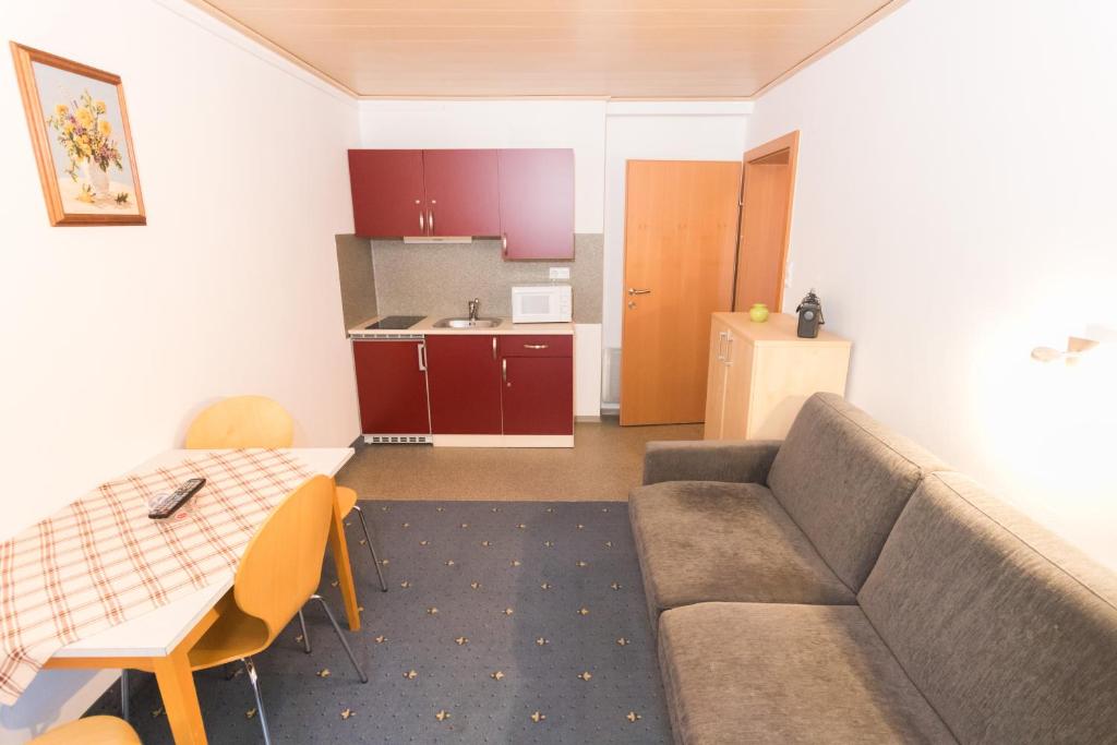 Kuchyň nebo kuchyňský kout v ubytování Pension Waldruh - Tannenheim