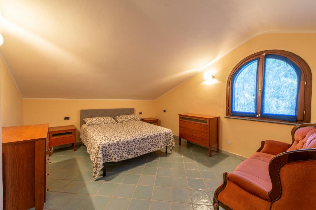 Posteľ alebo postele v izbe v ubytovaní Appartamenti Arco Antico