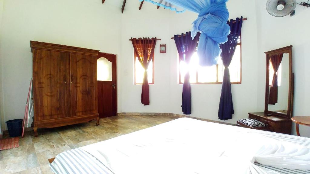 Postel nebo postele na pokoji v ubytování Guest House Basilea