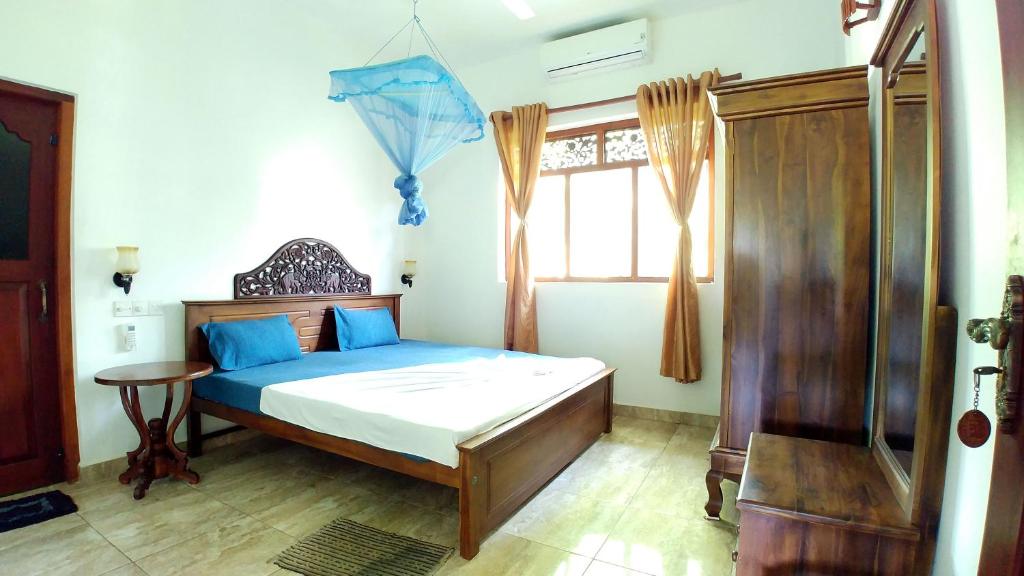 Postel nebo postele na pokoji v ubytování Guest House Basilea