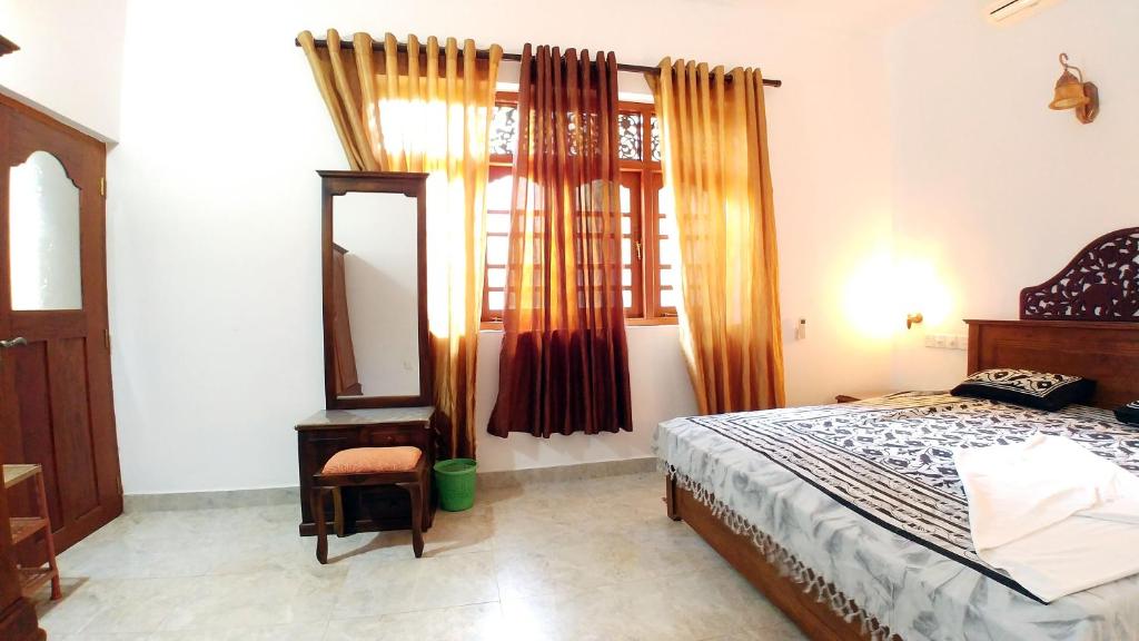 Postel nebo postele na pokoji v ubytování Guest House Basilea