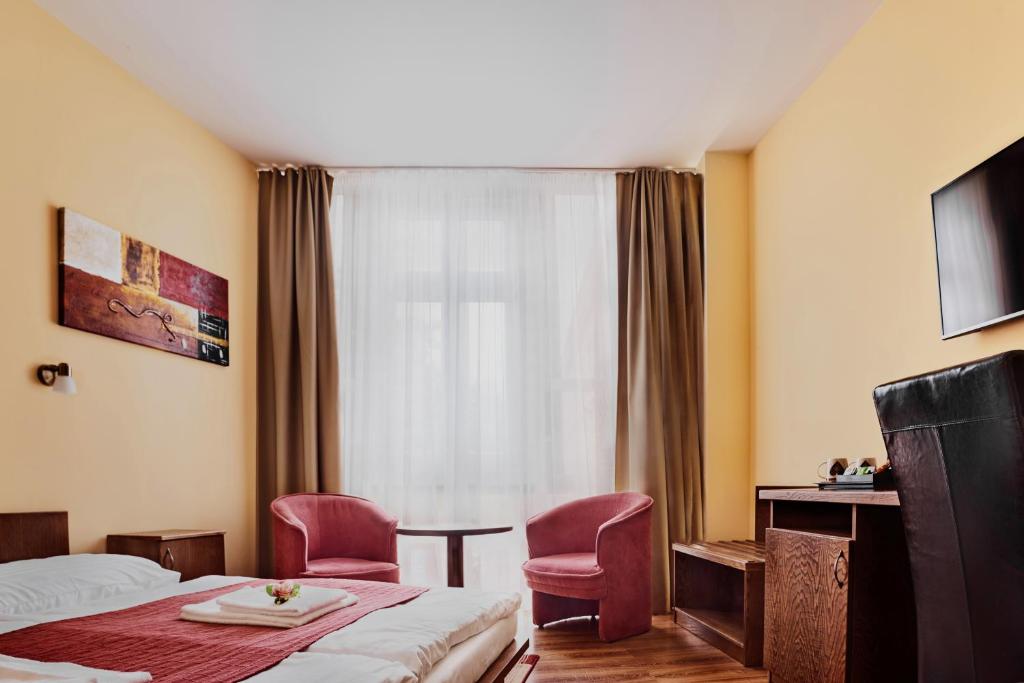 TV a/nebo společenská místnost v ubytování Hotel Banderium