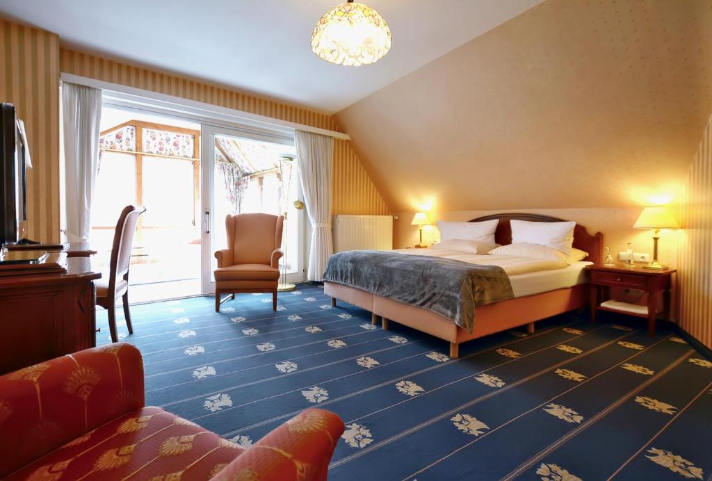 Postel nebo postele na pokoji v ubytování Hotel Jugendstil