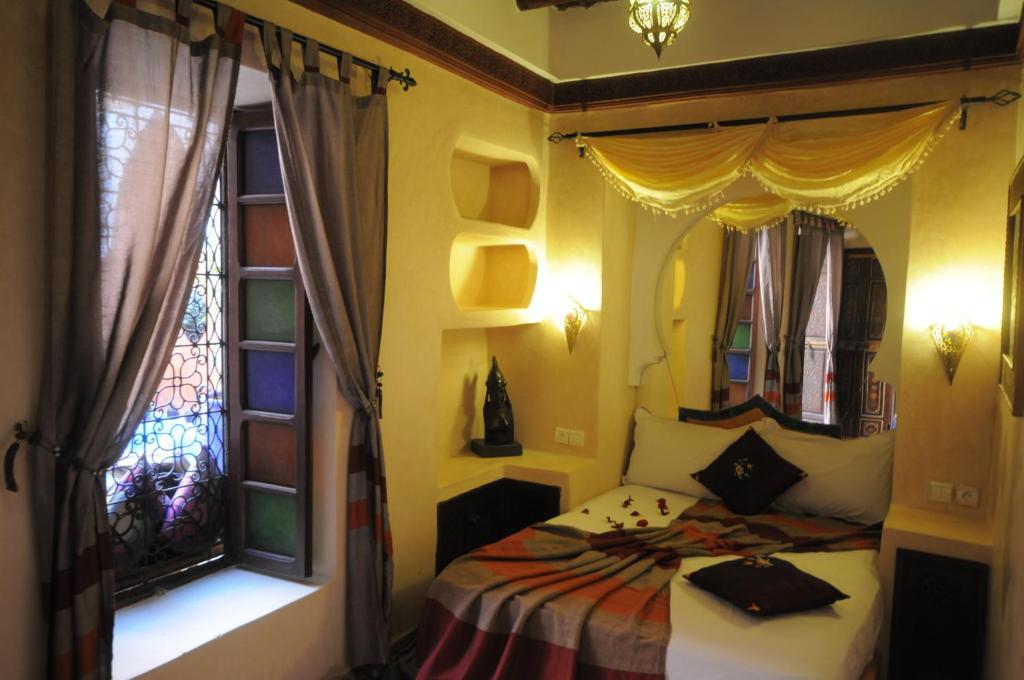 Un ou plusieurs lits dans un hébergement de l'établissement Riad Basma Marrakech
