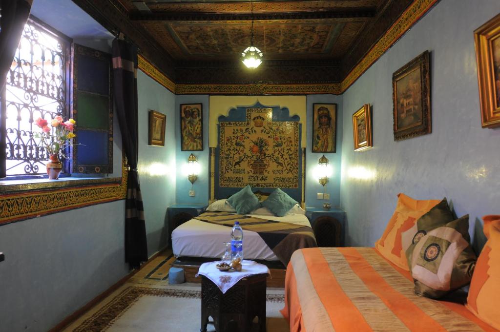 Un ou plusieurs lits dans un hébergement de l'établissement Riad Basma Marrakech