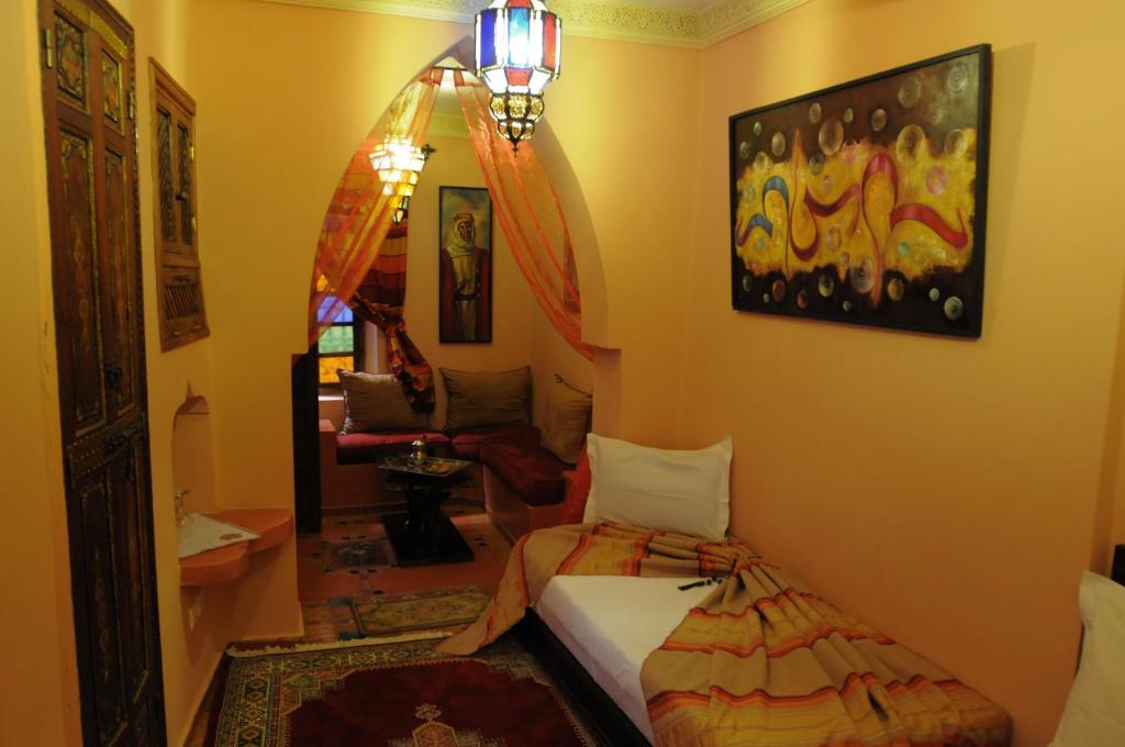 Un ou plusieurs lits dans un hébergement de l'établissement Riad Basma Marrakech