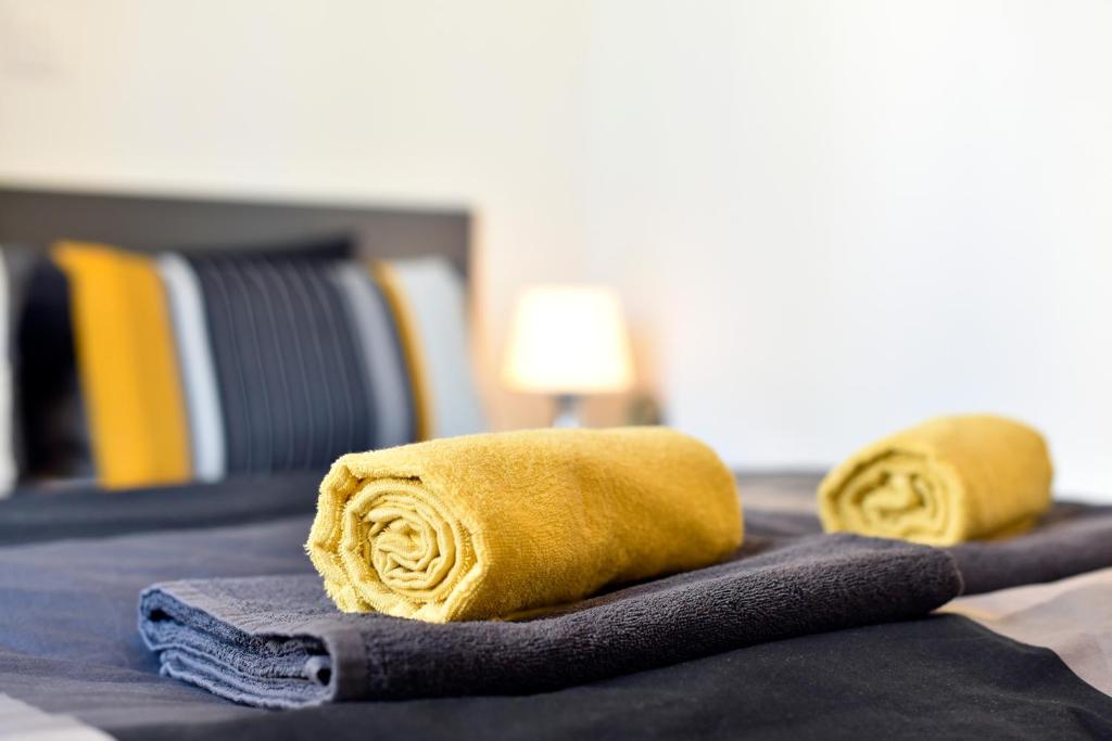Posteľ alebo postele v izbe v ubytovaní Agape Zagreb Apartments