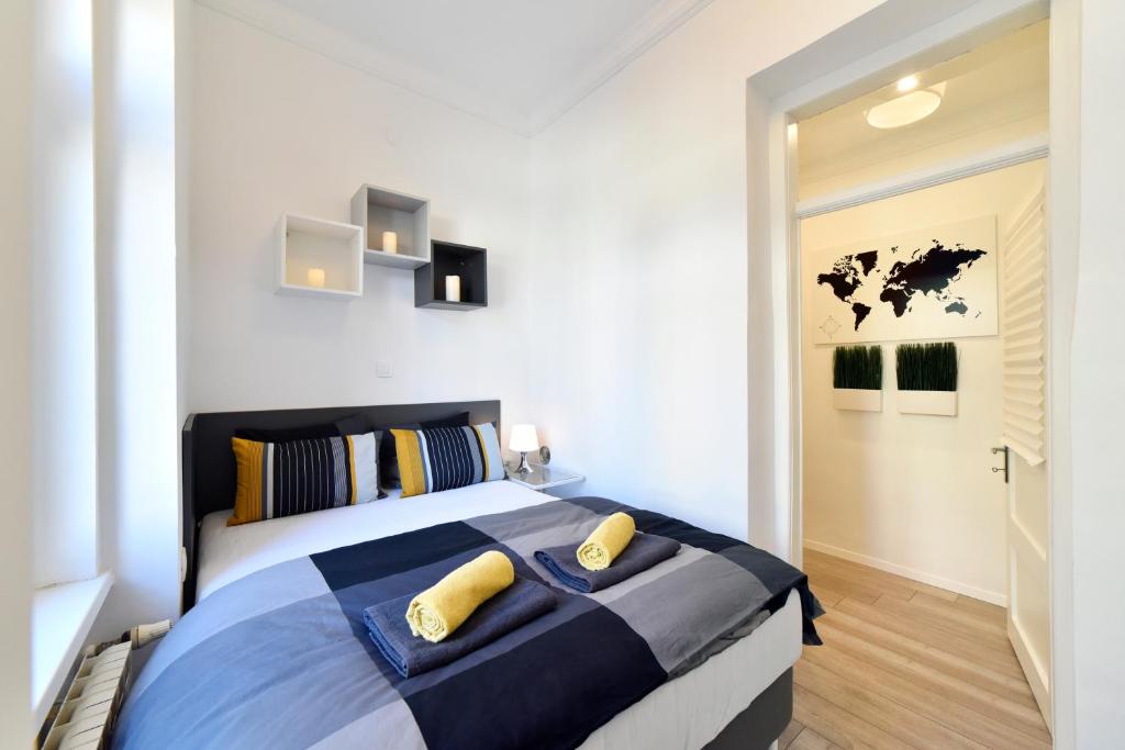 Posteľ alebo postele v izbe v ubytovaní Agape Zagreb Apartments