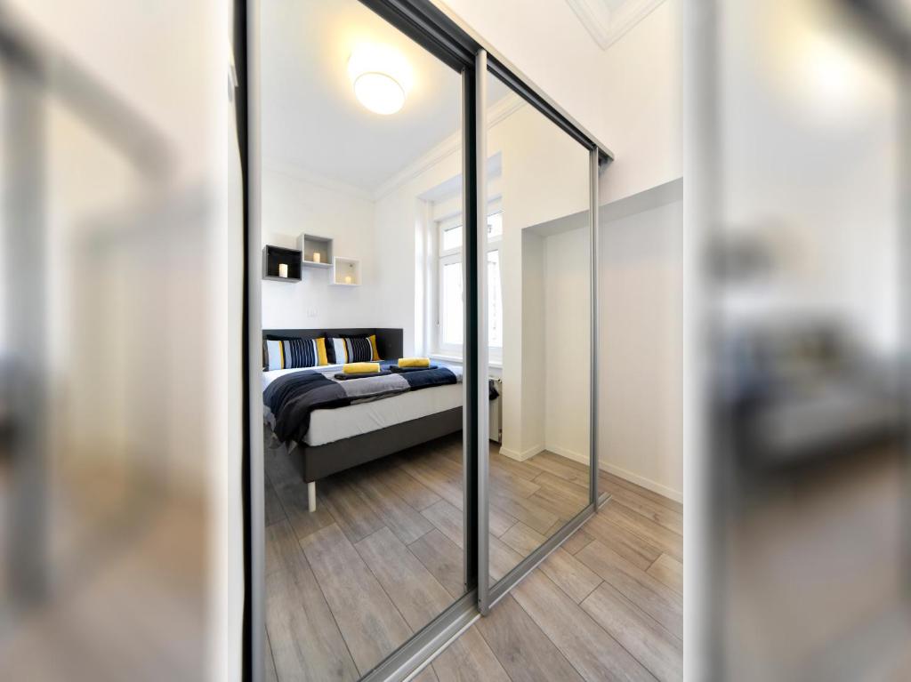 Posteľ alebo postele v izbe v ubytovaní Agape Zagreb Apartments