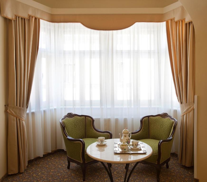 Posezení v ubytování Barokk Hotel Promenád